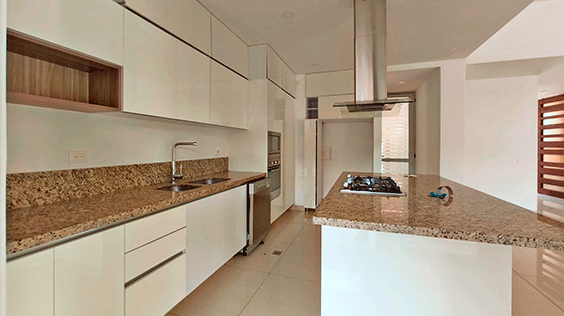 Cocina-integral-isla-meson-marmol-acabados-blanco-brillante